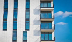 an apartment building with tinted windows